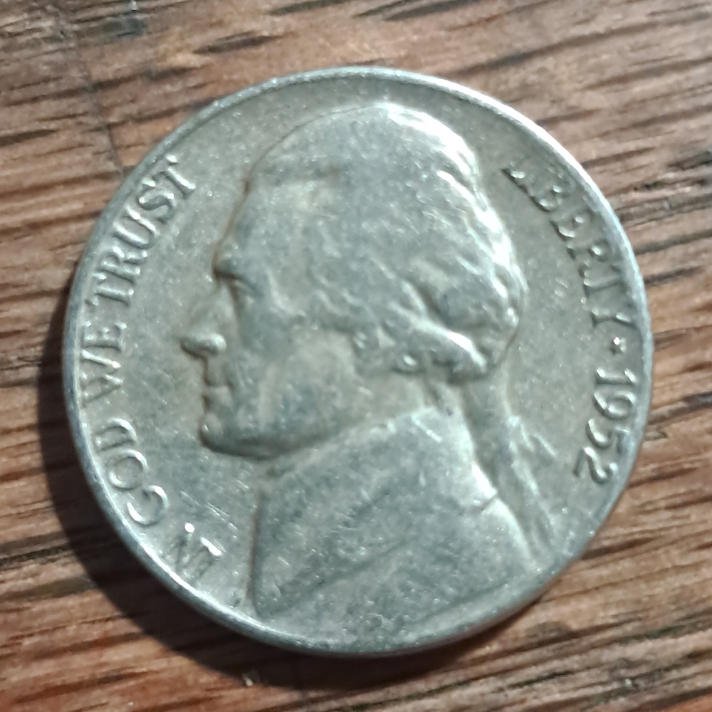 Silver Coin with Profile Design